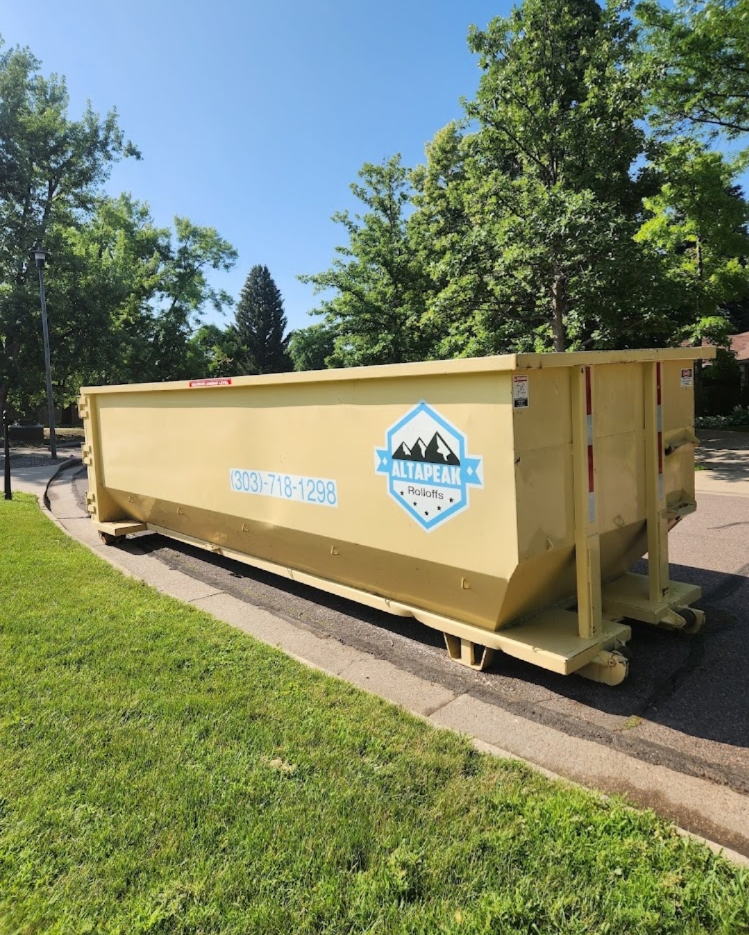 Altapeak Rolloffs 30 yard roll off dumpster on a Lakewood roof job